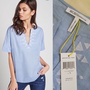 BCBGENERATION BOXY EMBROIDERED CHAMBRAY TOP